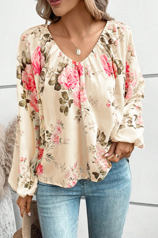 Blusa con cuello en V y manga farol con estampado floral en beige 