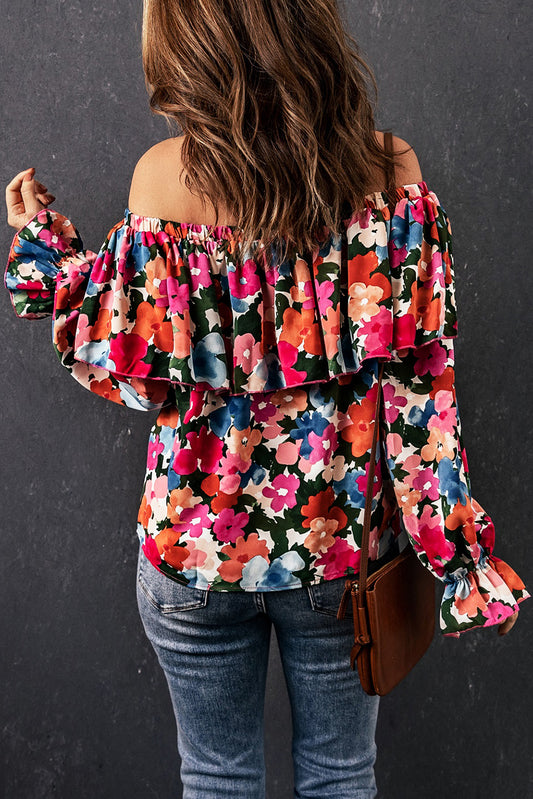 Blusa con hombros descubiertos y volantes con estampado floral