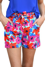 Shorts con cinturón y estampado floral