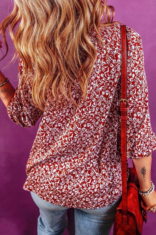 Blusa roja con estampado floral y cuello anudado de Biking 