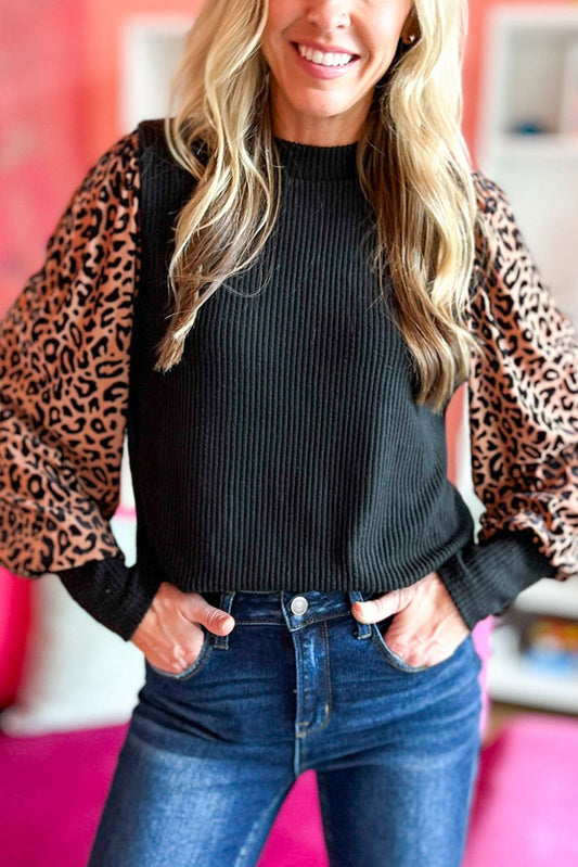 Blusa de punto de canalé de manga larga con estampado de leopardo negra 