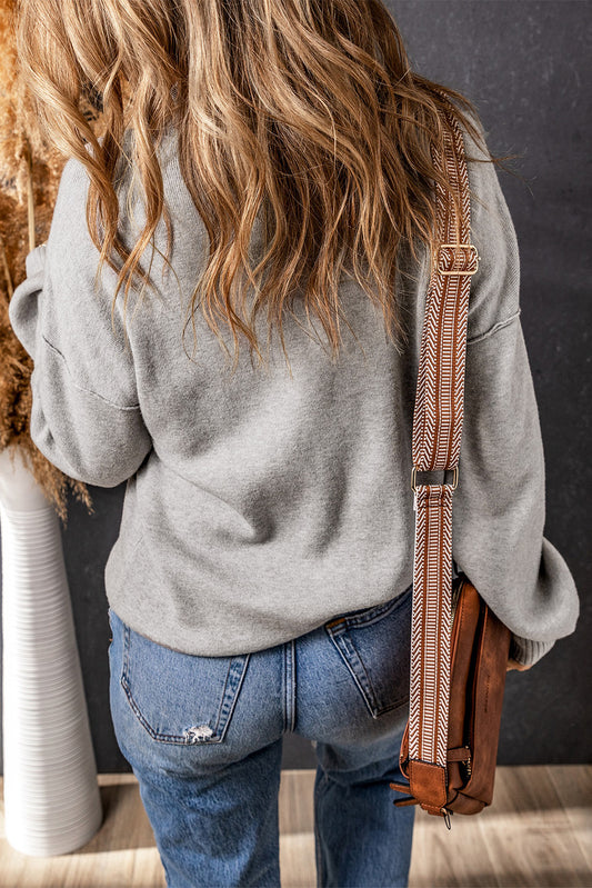 Jersey de punto con cuello alto y hombros caídos y manga abullonada gris 