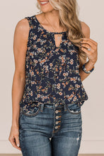 Top sin mangas floral con cuello redondo y decoración recortada