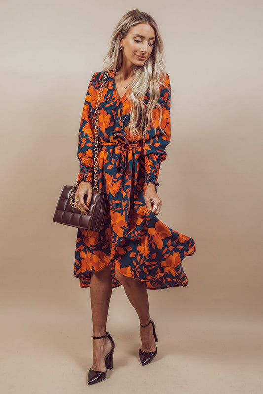 Vestido cruzado con cinturón y estampado floral naranja 