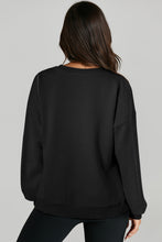 Black Solid O Neck High Low Hem Pullover Sweatshirt