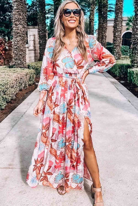 Vestido largo con abertura y cuello en V cruzado de manga larga con estampado de plantas tropicales