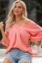 Blusa babydoll con manga pulsera y cuello en V texturizado rosa 