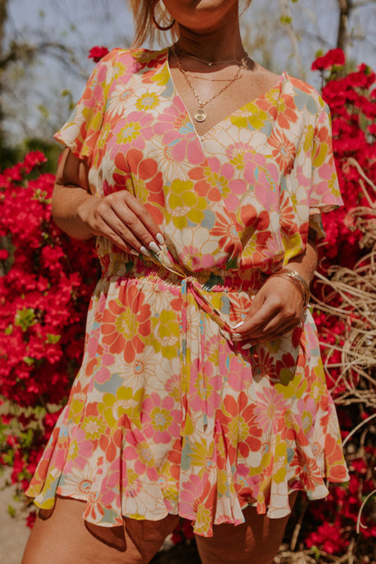 Top floral con mangas acampanadas y cuello levantado multicolor