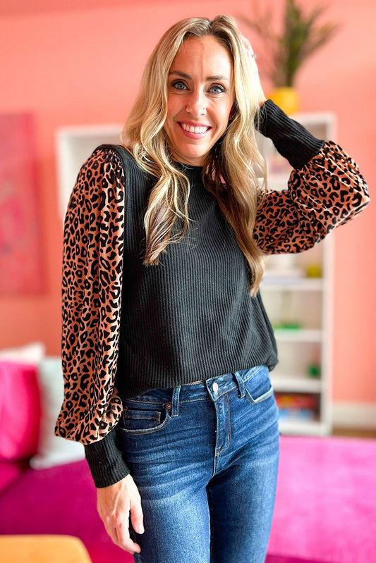 Blusa de punto de canalé de manga larga con estampado de leopardo negra 