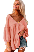 Blusa babydoll con manga pulsera y cuello en V texturizado rosa 