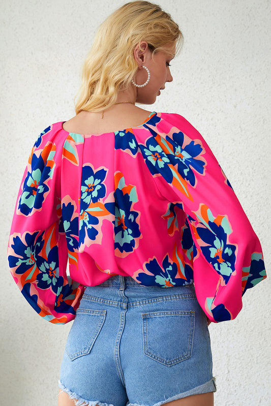 Blusa con mangas abullonadas y estampado de flores 