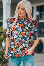 Top peplum con volantes y estampado floral