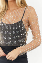 Top de malla transparente con detalle de perlas y diamantes de imitación negros