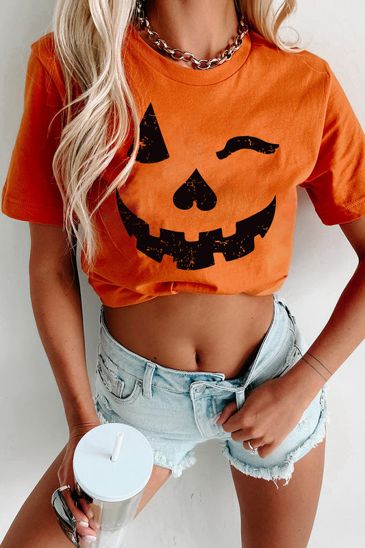 Camiseta con cuello redondo y estampado de cara de calabaza de Halloween naranja