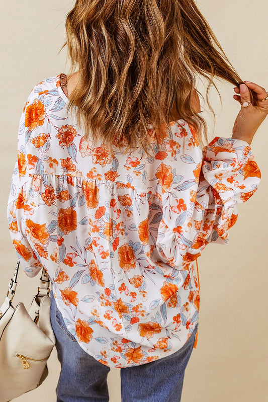 Blusa Dolman con estampado floral y cuello en V dividido 