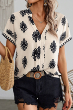 Black Geometric Print Short Sleeve V Neck Blouse