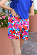 Shorts con cinturón y estampado floral