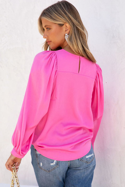 Blusa con cuello redondo de manga larga abullonada de satén rosa