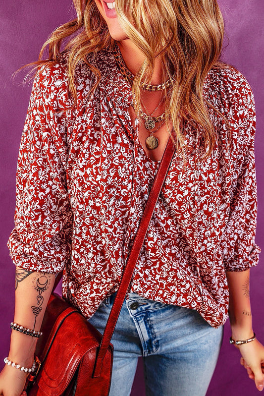 Blusa roja con estampado floral y cuello anudado de Biking 