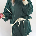 Evergreen Color Contrast Loose Pullover and Lace-up Waist Skort Set