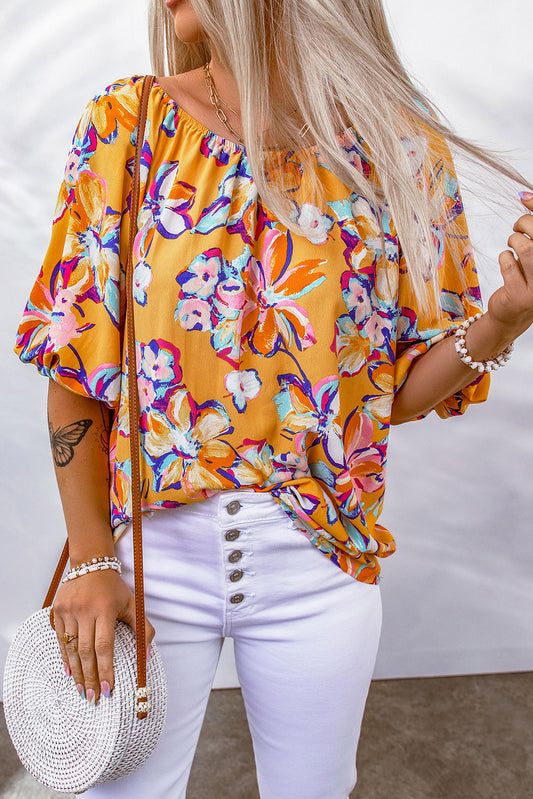 Blusa con escote elástico y estampado floral 