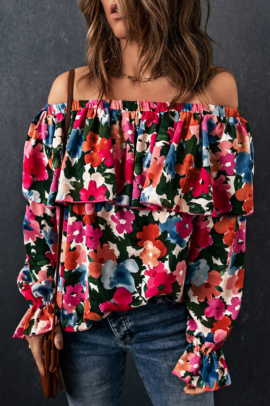 Blusa con hombros descubiertos y volantes con estampado floral