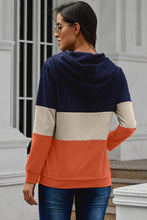 Sudadera con cuello con cremallera y bloques de color