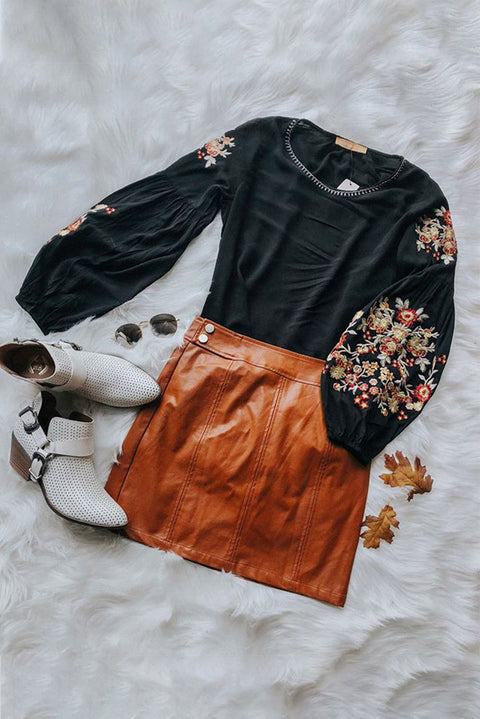 Top de manga larga con bordado floral