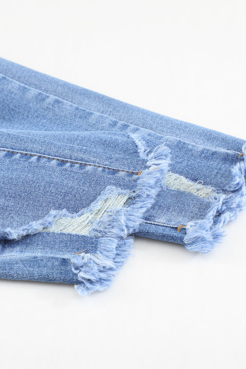 Jeans ajustados al tobillo desgastados con lavado medio