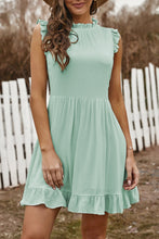 Vestido babydoll con volantes y bolsillos