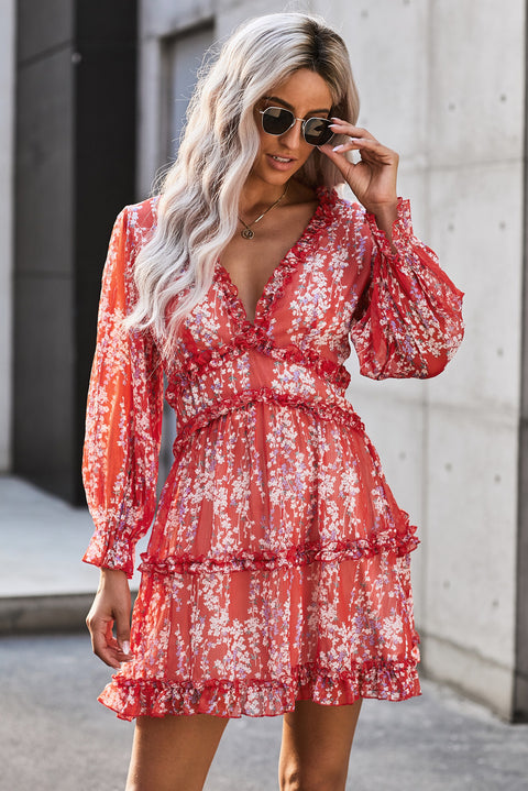 Vestido floral con espalda abierta y detalle de volantes